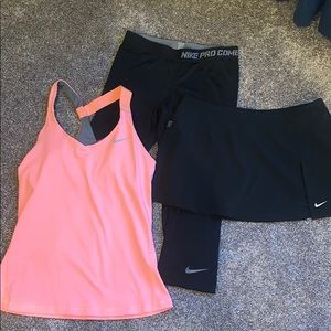 Nike tennis skort, bra top and Capri leggings